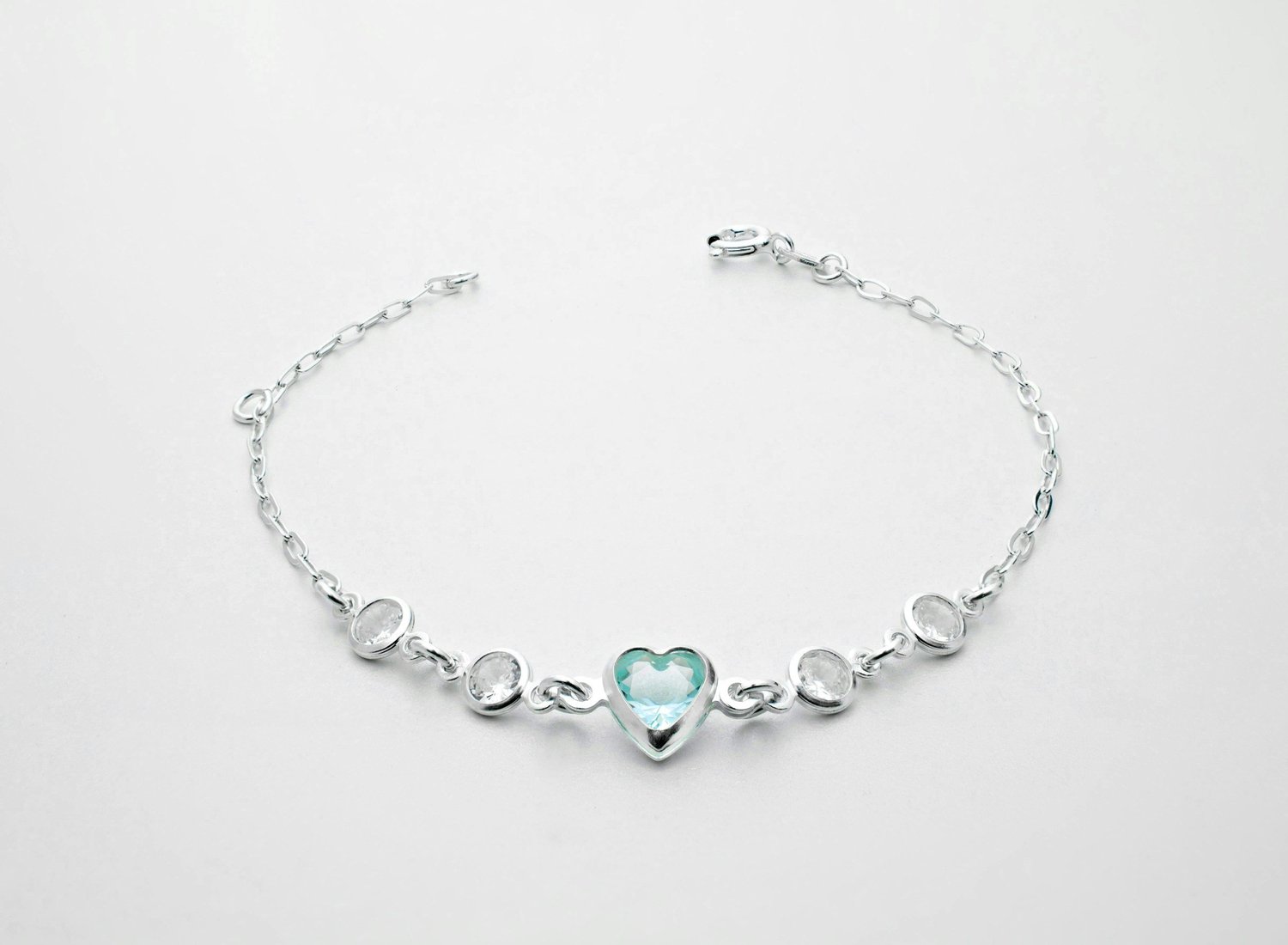 Silver bracelet with heart charm